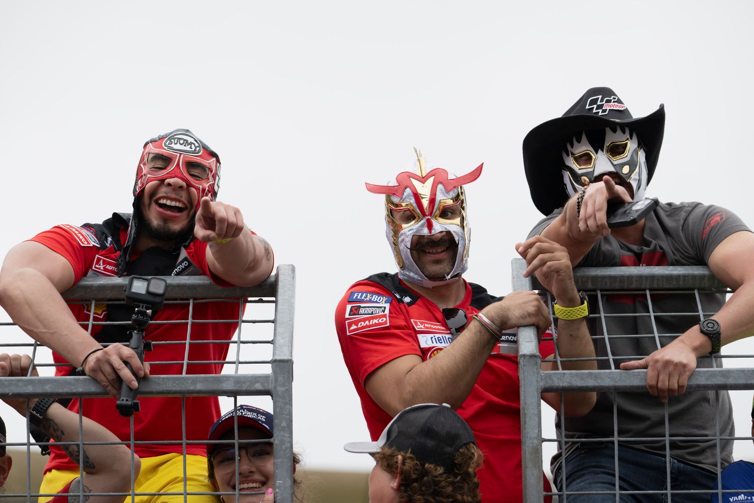 AUSTIN, TEXAS - MARCH 30: Fans celebrate in pit wall under the podium during the MotoGP race during the MotoGP Of USA - Race on March 30, 2025 in Austin, Texas. (Photo by Mirco Lazzari gp/Getty Images)