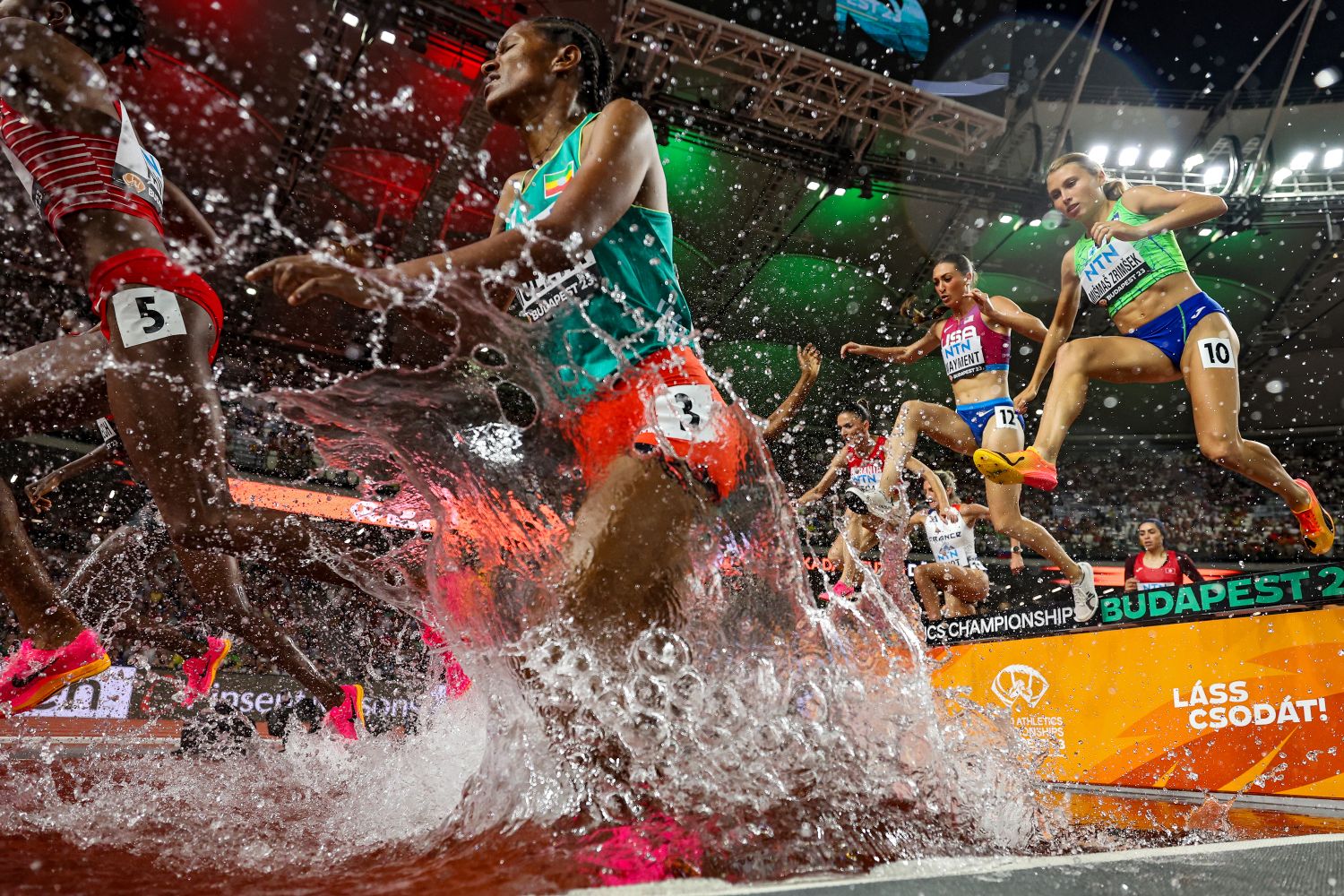 BUDAPEST, HUNGARY - AUGUST 27: Runners compete in the Women's 3000m Steeplechase Final during day nine of the World Athletics Championships Budapest 2023 at National Athletics Centre on August 27, 2023 in Budapest, Hungary. (Photo by Patrick Smith/Getty Images)