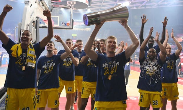 Alba Berlin players with the Basketball Bundesliga trophy in June, 2021. (Photo by Sebastian Widmann/Getty Images)