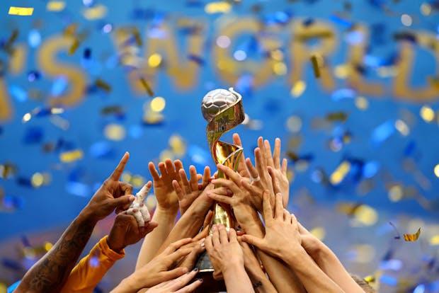 USA lift 2019 FIFA Women's World Cup  trophy at Stade de Lyon (Photo by Richard Heathcote/Getty Images)