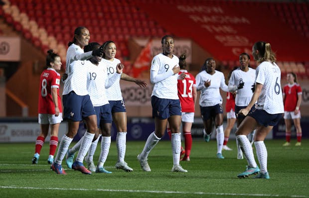 Wendie Renard of France (L) celebrates after scoring her side's first goal during the 2023 Fifa Women's World Cup qualifying match against Wales on April 8, 2022 (by Ryan Hiscott/Getty Images)