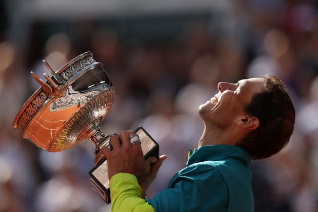 Rafael Nadal of Spain celebrates with trophy after winning final of 2022 French Open (Photo by Clive Brunskill/Getty Images)