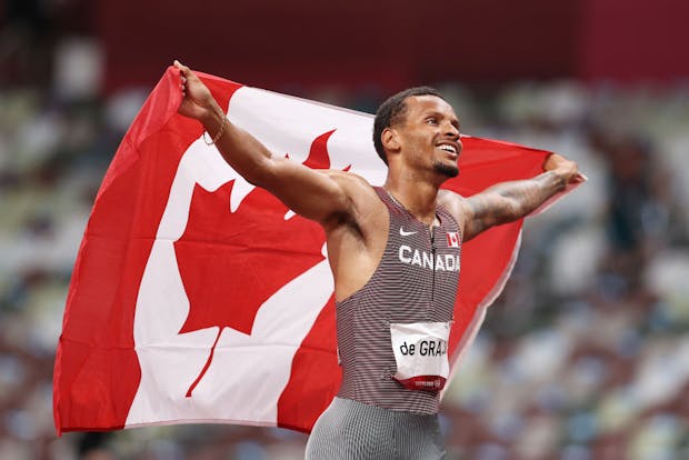 Andre De Grasse of Canada celebrates after winning men's 200m final on day 12 of the Tokyo 2020 Olympics (Photo by Cameron Spencer/Getty Images)