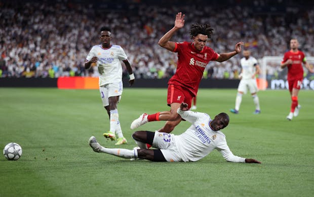 Trent Alexander-Arnold of Liverpool is challenged by Ferland Mendy of Real Madrid during the Uefa Champions League final (Photo by Julian Finney/Getty Images)
