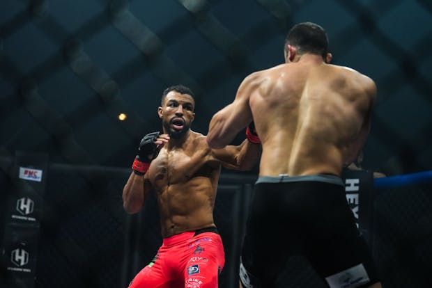 Karl Amoussou and Andre Santos in action at the Hexagone MMA 2 event in Paris. (Photo by Edward Berthelot/Getty Images)