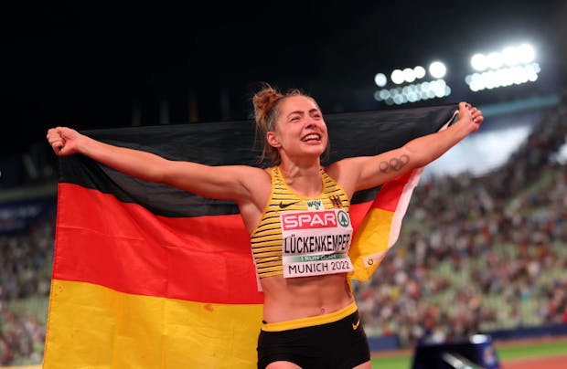 Germany's Gina Lueckenkemper celebrates after winning women's 100m final in Munich  (Photo by Amin Mohammad Jamali/Getty Images)