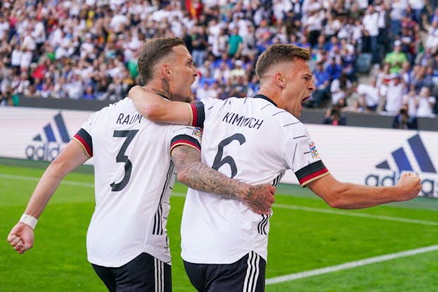 Joshua Kimmich celebrates with David Raum after scoring during Germany's Uefa Nations League match against Italy on June 14, 2022 (by Joris Verwijst/BSR Agency/Getty Images)
