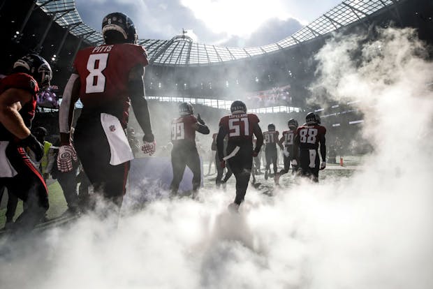 The Atlanta Falcons take the field for a 2021 National Football League game in London, United Kingdom, against the New York Jets at Tottenham Hotspur Stadium. (Photo by Tom Jenkins/Getty Images)