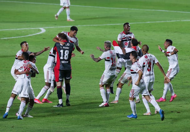 Players of Sao Paulo celebrate after winning the second leg final match against Palmeiras as part of Campeonato Paulista 2021 (by Alexandre Schneider/Getty Images)