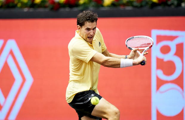 Dominic Thiem of Austria returns a ball against Marcos Giron (Photo by Mateo Villalba/Quality Sport Images/Getty Images)