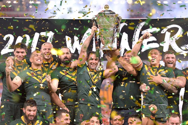 Australian Kangaroos celebrate victory as captain Cameron Smith holds up the trophy at 2017 Rugby League World Cup (Photo by Bradley Kanaris/Getty Images)