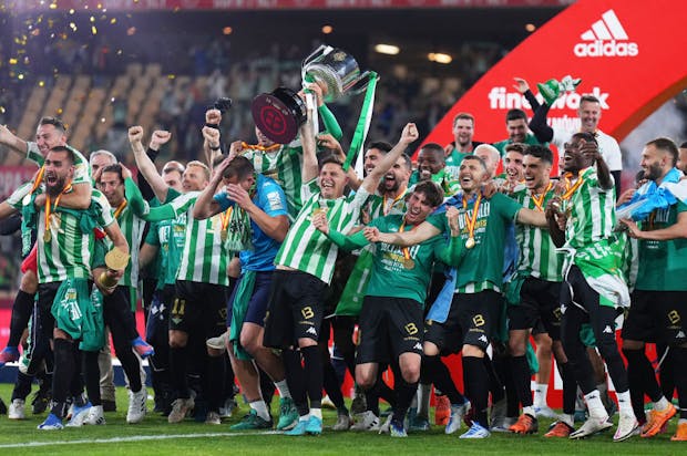 Joaquin of Real Betis lifts trophy after Copa del Rey final v Valencia at Estadio La Cartuja on April 23, 2022 (by Angel Martinez/Getty Images)
