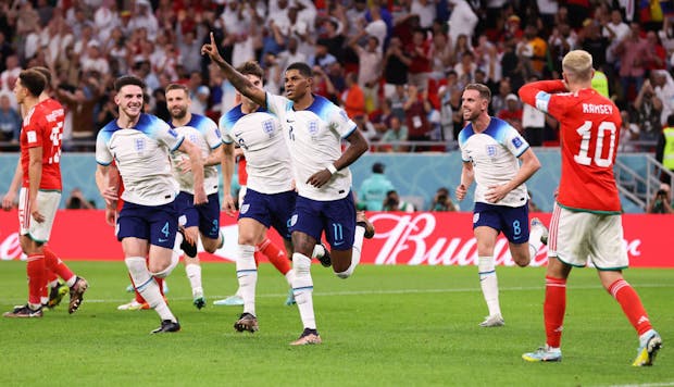 Marcus Rashford of England celebrates after scoring his side's first goal  during the World Cup match against Wales (Photo by Alex Livesey - Danehouse/Getty Images)