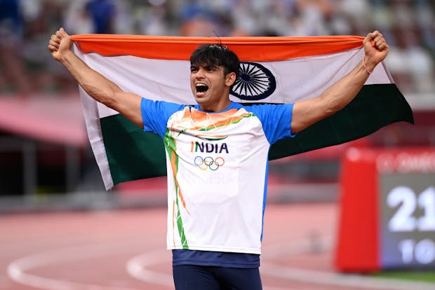 Neeraj Chopra of Team India celebrates winning the gold medal in the men's javelin at Tokyo 2020 (Photo by Matthias Hangst/Getty Images)