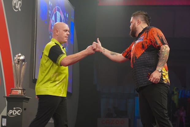 Michael Smith (R) and Michael van Gerwen (L) during Cazoo World Darts Championship final on January 3, 2023 (Photo by Pieter Verbeek/BSR Agency/Getty Images)