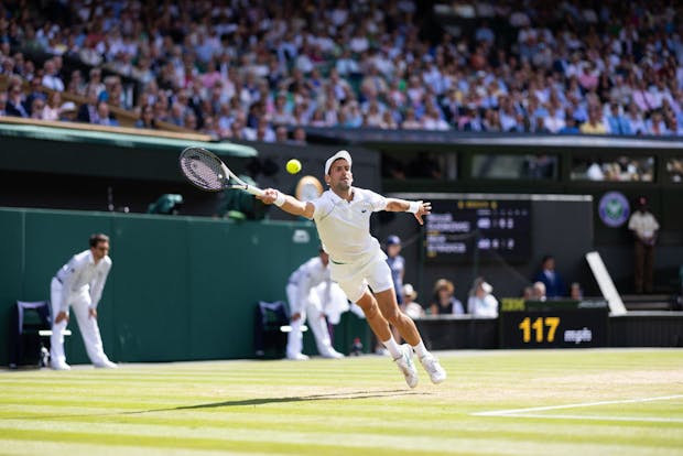 Novak Djokovic on his way to victory over Nick Kyrgios during the men's singles final at the 2022 Wimbledon Championships (by Simon Bruty/Anychance/Getty Images)
