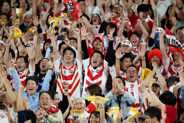 Japan fans celebrate victory after the 2019 Rugby World Cup game against Scotland (Photo by Dan Mullan/Getty Images)