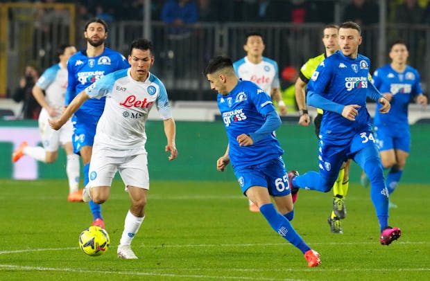 Hirving Lozano of SSC Napoli competes for the ball with Fabiano Parisi and Ardian Ismajli of Empoli (Photo by MB Media/Getty Images)