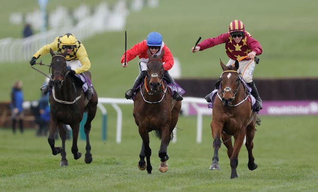 Jack Kennedy on board Minella Indo (R) on the run up the hill to win the Gold Cup during the 2021 Cheltenham Festival (by Tom Jenkins/Getty Images)