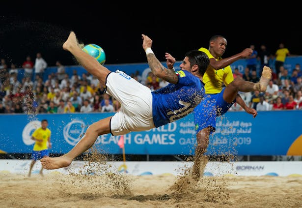 Italy and Brazil in semi-final beach soccer action during the 2019 ANOC World Beach Games (by Quality Sport Images/Getty Images)