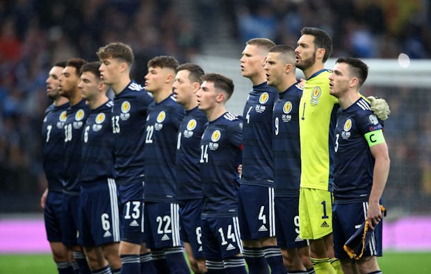 Andy Robertson of Scotland leads team as they line up to face Israel in 2022 FIFA World Cup Qualifier (Photo by Ian MacNicol/Getty Images)