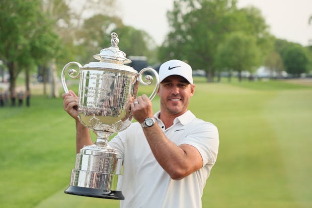 Brooks Koepka celebrates with the Wanamaker Trophy after winning the 2023 PGA Championship at Oak Hill Country Club (Getty Images)