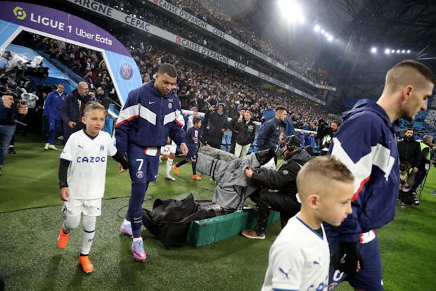 PSG's Kylian Mbappe enters the field for the Ligue 1 match v Olympique Marseille. (Photo by Xavier Laine/Getty Images)