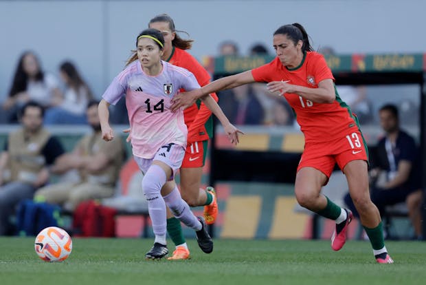 Yui Hasegawa of Japan in action against Fatima Pinto of Portugal during an international friendly match on April 7, 2023 (by Eric Verhoeven/Soccrates/Getty Images)