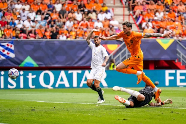 Wout Weghorst of the Netherlands scores a disallowed goal past Gianluigi Donnarumma of Italy (Photo by Rene Nijhuis/BSR Agency/Getty Images)