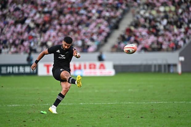 Richie Mo'unga of New Zealand scores a conversion during the international Test match against Japan (Photo by Kenta Harada/Getty Images)