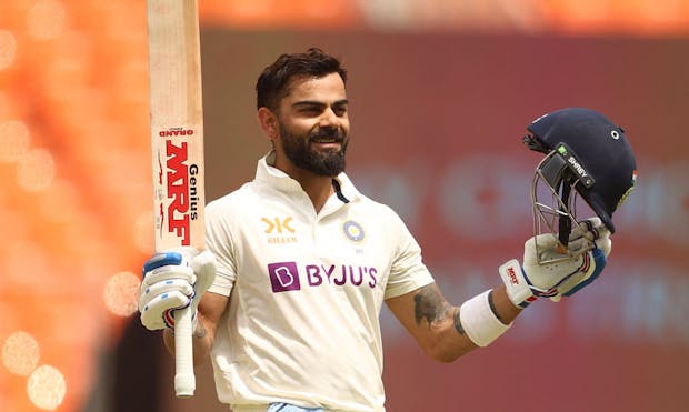Virat Kohli of India celebrates after scoring his century during day four of the Fourth Test match in the series between India and Australia (Photo by Robert Cianflone/Getty Images)