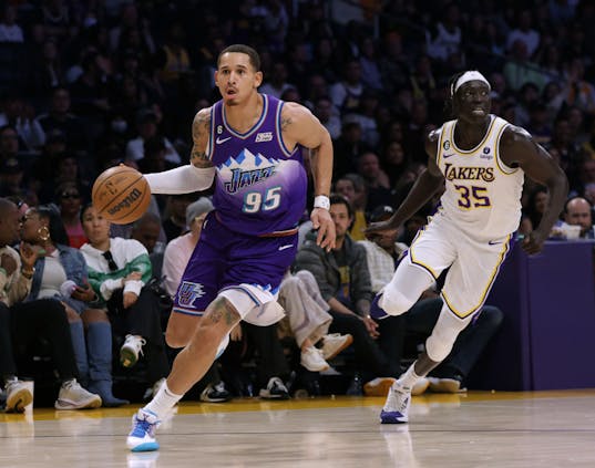 Juan Toscano-Anderson #95 of the Utah Jazz drives to the basket in front of Wenyen Gabriel #35 of the Los Angeles Lakers during the first half at Crypto.com Arena on April 09, 2023 in Los Angeles, California. (Photo by Harry How/Getty Images)