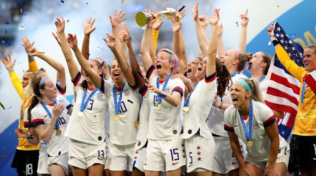 USA players celebrate with the trophy after the 2019 Fifa Women's World Cup final (Photo by Marc Atkins/Getty Images)
