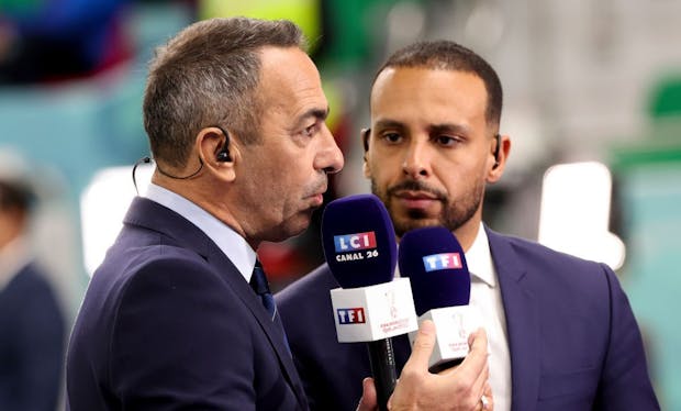 TF1 commentators Youri Djorkaeff, Saber Desfarges at the 2022 FIFA World Cup. (Photo by Jean Catuffe/Getty Images)