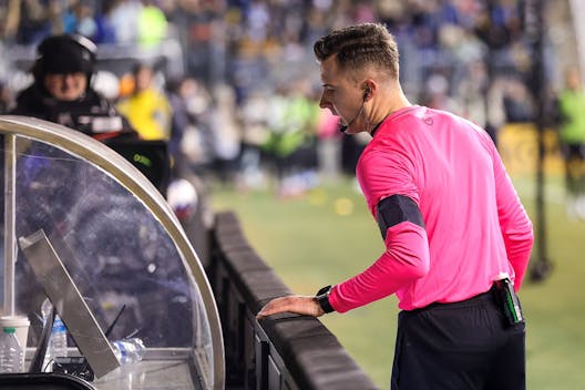CHESTER, PENNSYLVANIA - FEBRUARY 25: Referee Lukasz Szpala reviews a VAR decision during the second half between Philadelphia Union and Columbus Crew at Subaru Park on February 25, 2023 in Chester, Pennsylvania. (Photo by Tim Nwachukwu/Getty Images)