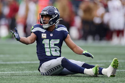 SEATTLE, WASHINGTON - NOVEMBER 12: Tyler Lockett #16 of the Seattle Seahawks reacts after an incomplete pass during the second quarter against the Washington Commanders at Lumen Field on November 12, 2023 in Seattle, Washington. (Photo by Steph Chambers/Getty Images)