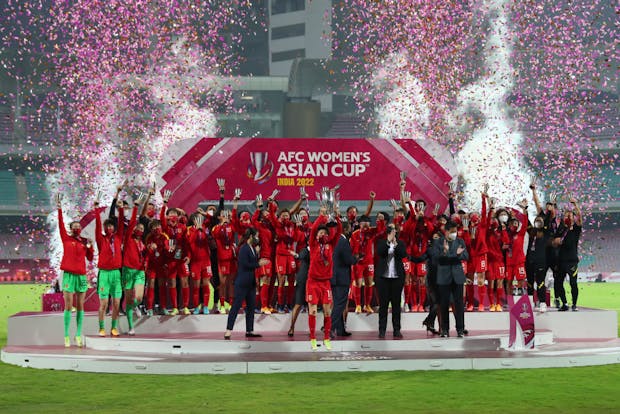 China celebrates winning the AFC Women's Asian Cup in India. (Photo by Thananuwat Srirasant/Getty Images)