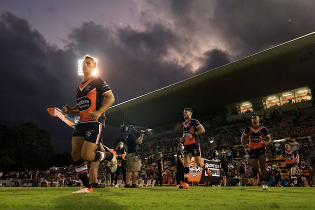 Luke Brooks leads out the Wests Tigers at Leichhardt Oval in Sydney. (Photo by Mark Evans/Getty Images)