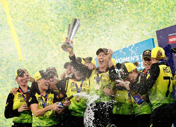 Australia celebrates winning the 2020 Women's T20 World Cup. (Photo by Ryan Pierse/Getty Images)