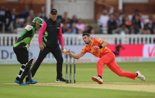 Phoenix bowler Benny Howell fields off his own bowling during The Hundred Final match between Birmingham Phoenix and Southern Brave (Photo by Stu Forster/Getty Images)