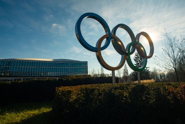 The Olympic Rings sit on display outside the International Olympic Committee Headquarters in Lausanne (Photo by David Ramos/Getty Images)