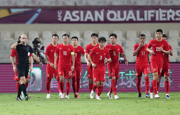 China faces Australia at Sharjah Stadium during a Fifa World Cup Asian Qualifier on November 16, 2021. (Photo by Neville Hopwood/Getty Images)