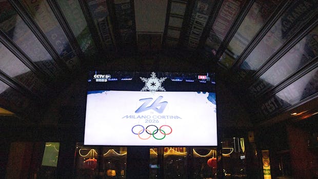 The logo for the 2026 Milan Cortina Winter Olympic Games is shown during the closing ceremony of the 2022 Beijing Winter Games on February 20, 2022. (Getty Images)