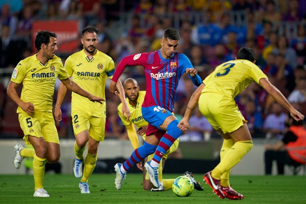 Ferran Torres of FC Barcelona runs with the ball during the LaLiga match against Villarreal CF on May 22, 2022 (by Manuel Queimadelos/Quality Sport Images/Getty Images)