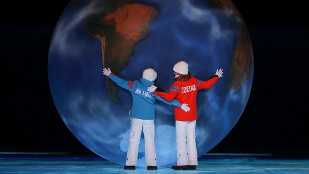 Children representing Milan and Cortina hug a globe as part of the handover ceremony during the Beijing 2022 Winter Olympics Closing Ceremony on February 20, 2022. (Photo by Maja Hitij/Getty Images)