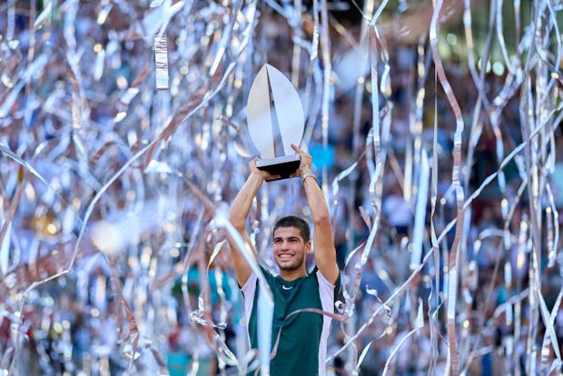 Carlos Alcaraz of Spain lifts the men's singles Madrid Open trophy in 2022. (Photo by Jose Manuel Alvarez/Quality Sport Images/Getty Images)