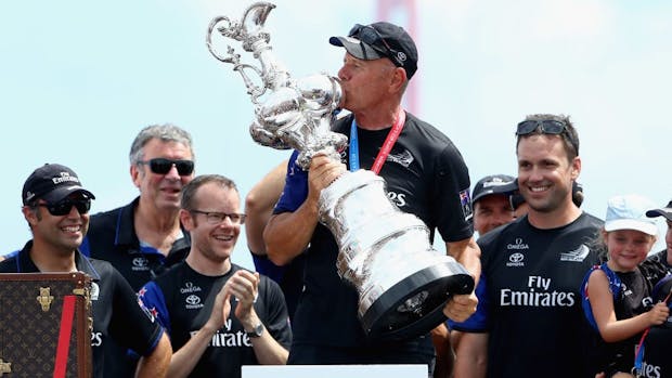 Grant Dalton, chief executive of Emirates Team New Zealand lifts the America's Cup trophy in June 26, 2017 in Hamilton, Bermuda. (Photo by Ezra Shaw/Getty Images)