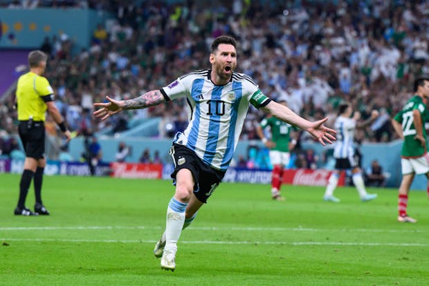 Lionel Messi celebrates after scoring for Argentina at the FIFA World Cup in Qatar. (by Markus Gilliar - GES Sportfoto/Getty Images)