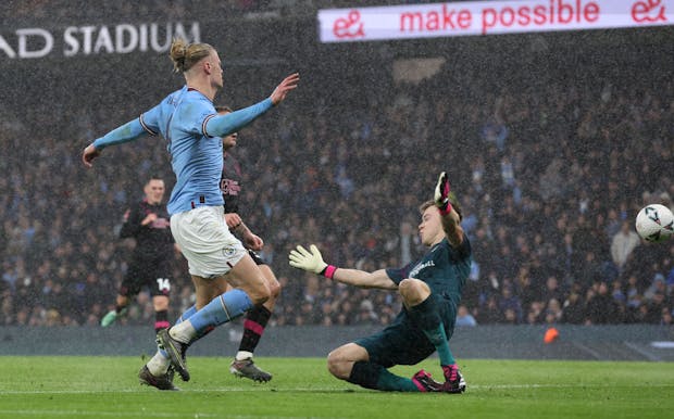 Erling Haaland of Manchester City scores during the FA Cup quarter final match against Burnley on March 18, 2023 (by Alex Livesey - Danehouse/Getty Images)