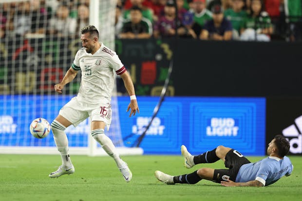 Héctor Herrera of Mexico in front of a Bud Light advertising board during an international friendly match in Glendale, Arizona against Uruguay in 2022 (Getty Images)